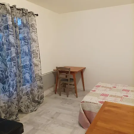 Quarto em Acomodações Particulares Chez Corinne